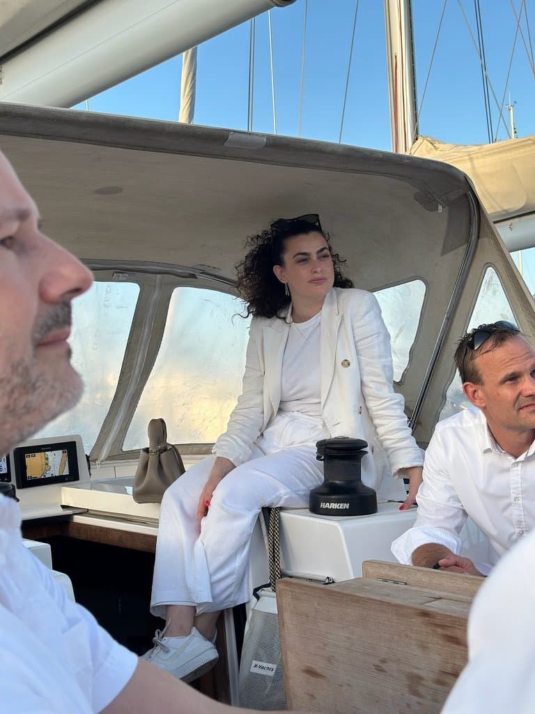 Noam on a sailboat during the leadership programme offsite